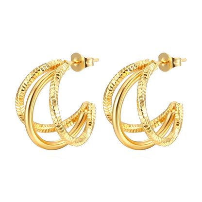 Twirl by Viora - 18K gold plated Stainless Steel Earrings